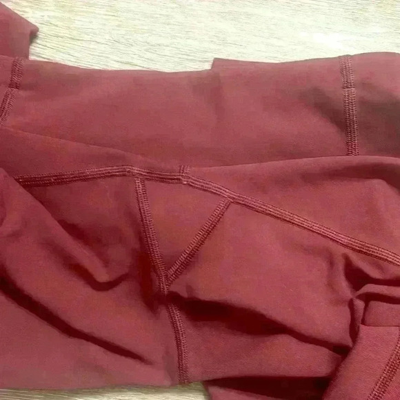 Lululemon Tight Stuff Tight II 25" size 4 like new condition 
Deep Ruby - Picture 14 of 16